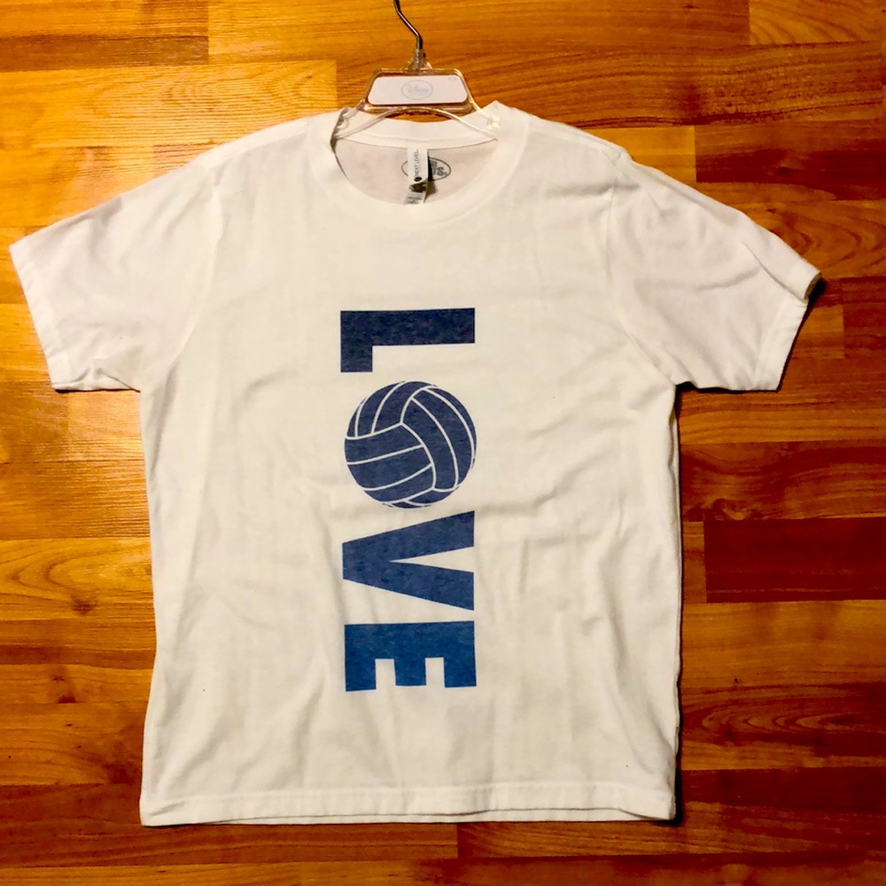 A child’s large volleyball t-shirt worn once white shirt with light blue writing